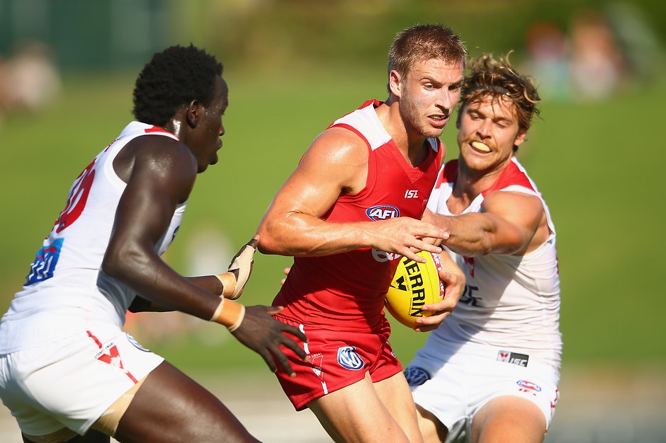 AFL 2016 Training - Sydney Intra-Club Match Kieren Jack tries to burst through a tackle during the Swans' recent intraclub - ${keywords}